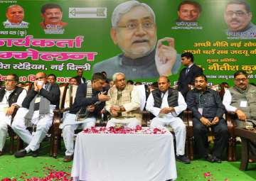 Nitish Kumar with other leaders during the party's Delhi Pradesh Karyakarta Sammelan in New Delhi on Sunday