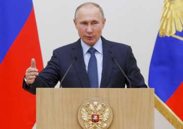 Vladimir Putin declares victory in Syria, announces partial pullout of forces