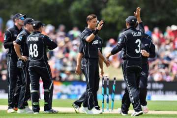 Trent Boult is congratulated by teammates after dismissing Kyle Hope during second ODI at Hagley Oval