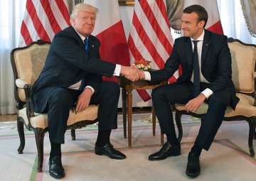 File pic - Donald Trump will bring US back into climate deal, says Emmanuel Macron