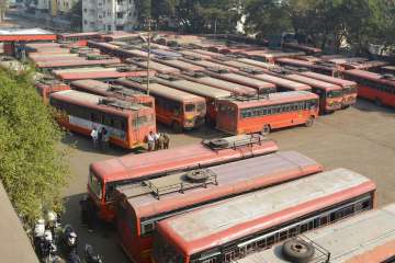 Buses of the Maharashtra State Road Transport Corporation and auto rickshaws remained off the road. PTI Photo.