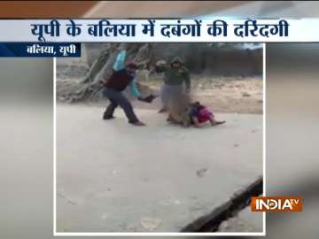 Woman mercilessly beaten up with stick over property dispute in Uttar Pradesh's Baliya.