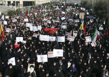 File pic - Iranian protesters chant slogans at a rally in Tehran