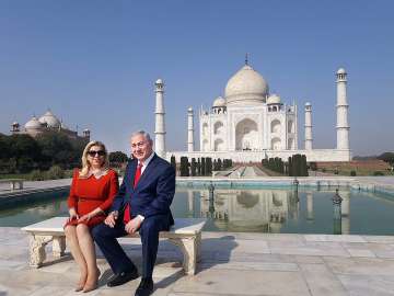 Israeli PM Benjamin Netanyahu and his wife Sara Netanyahu pose for a picture during a visit to historic Taj Mahal in Agra.