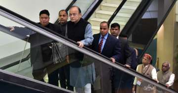 Union Finance Minister Arun Jaitley arrives for a GST meeting at Vigyan Bhavan in New Delhi.