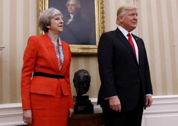 File pic -  Theresa May and Donald Trump 