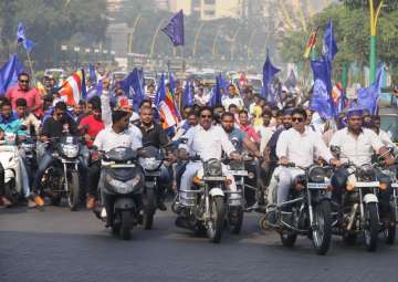 Dalit protesters take part in a bike rally on the Eastern Express Highway in Thane on Wednesday after Bhima Koregaon violence