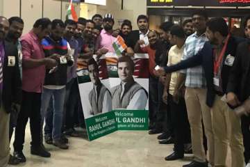 Fans and well wishers throng the Bahrain Airport to greet Congress President Rahul Gandhi