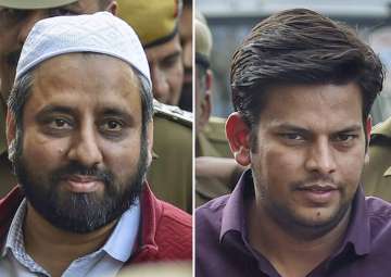 This combination of photos show AAP MLAs Amanatullah Khan and Prakash Jarwal being produced at Tees Hazari Court in Delhi chief secretary alleged assault case in New Delhi, on Wednesday.