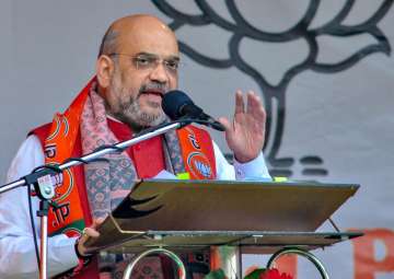 BJP President Amit Shah addresses a rally during a campaign ahead of Meghalaya Assembly Elections in Shillong on Friday