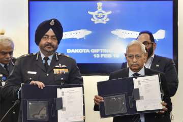 Air Chief Marshal B S Dhanoa with Air Commodore (retd) M K Chandrasekhar during a function to mark ceremonial gifting of the Douglas DC3 Dakota to IAF, in New Delhi on Tuesday.