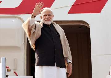 PM Narendra Modi waves as he embarks on a 4-day visit to Jordan, Palestine, UAE and Oman from New Delhi on Friday