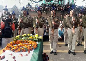 CRPF personnel pay gun salute to Constable Mujahid Khan, who was killed in the terrorist attack at Jammu's Sunjuwan Army Camp, at Piro in Bhojpur district of Bihar on Wednesday