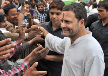 Congress President Rahul Gandhi meets people during a rally in Koppal, Karnataka on Saturday