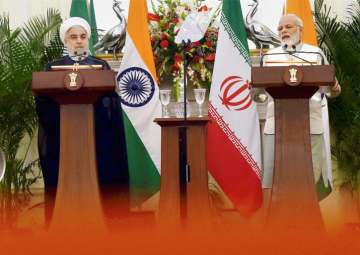 PM Narendra Modi and Iranian President Hassan Rouhani during agreement signing ceremony at Hyderabad House in New Delhi on Saturday