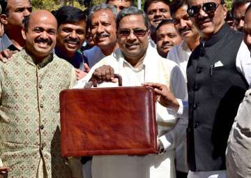 Karnataka CM Siddaramaiah arrives at Vidhana Soudha to present the state budget in Bengaluru on Friday.