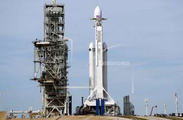 A Falcon 9 SpaceX heavy rocket stands ready for launch on pad 39A at the Kennedy Space Center in Cape Canaveral, Florida on Monday, February 5, 2018. 