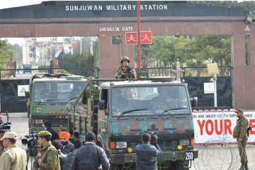 Security forces' personnel guard at Sunjuwan Military Station during a terrorist attack, in Jammu on Sunday.