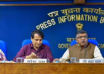 Union ministers Suresh Prabhu, Ravi Shanker Prasad during a press briefing on the Cabinet meeting in New Delhi on Wednesday.