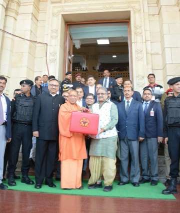 UP CM Yogi Adityanath with state finance minister Rajesh Agarwal