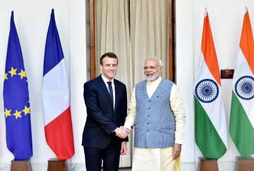 French President Emmanuel Macron with PM Narendra Modi.