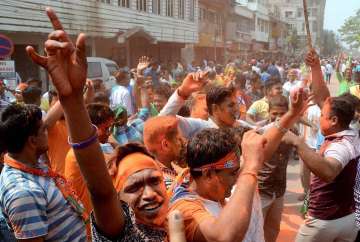 BJP workers celebrating party's lead in Tripura Elections 2018