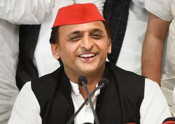 SP president Akhilesh Yadav addresses a press conference after the by-election results, at the party headquarters in Lucknow on Wednesday.