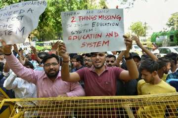 Students and parents affected by CBSE paper leak took to streets to protest the system failure