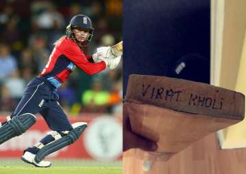 Danni Wyatt and the bat gifted to her by Virat Kohli