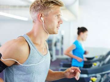 Want to lose weight? Listen to music while exercising