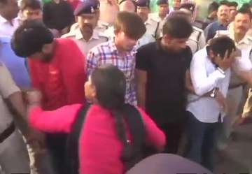 Accused thrashed by women