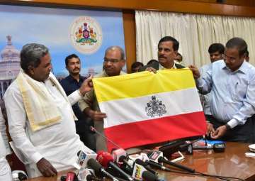Karnataka CM Siddaramaiah unveils proposed official state flag
