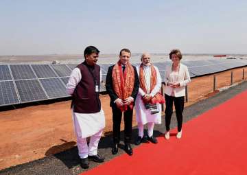  Prime Minister Narendra Modi and the President of the French Republic, Emmanuel Macron at the inauguration of the Solar Power Plant, at Mirzapur, on Monday.