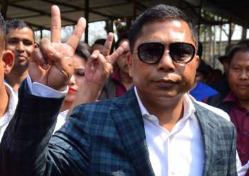 Meghalaya Chief Minister and Congress candidate Mukul Sangma flashes victory sign after winning in his constituency in the Meghalaya Assembly elections at Ampati in South-West Garo Hills on Saturday.