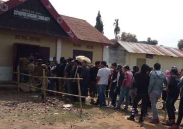 People wait in queues to cast their vote during Nagaland Assembly elections in Nagaland's Dimapur on Feb 27, 2018.