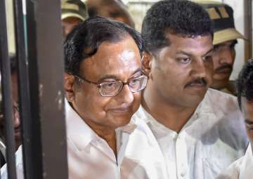 Former finance minister P Chidambaram leaves Patiala House Courts after his son, Karti Chidambaram, was remanded to five-day CBI custody in the INX Media case, in New Delhi on Thursday.
