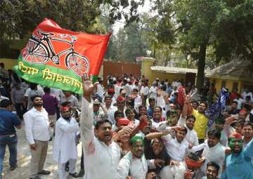 Samajwadi party workers celebrate their party success in Phulpur by-election, in Lucknow 