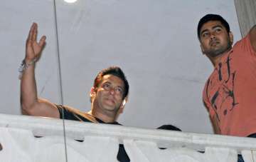Salman Khan greeting his fans on Saturday evening