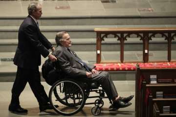 Foremer Presidents George W. Bush, left, and George H.W. Bush arrive at St. Martin’s Episcopal Church for a funeral service for former first lady Barbara Bush, Saturday, April 21, 2018, in Houston.