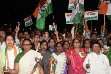 Congress workers taking out candle light march in Lucknow on Friday against Kathua and Unnao rape cases.