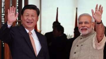 File: Prime Minister Narendra Modi and Chinese President Xi Jinping 