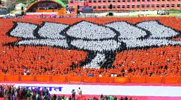 A file photo of BJP's lotus symbol made by party workers during its foundation day celebration