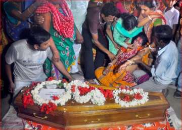 Family members of Samar Tikadar, one of the Indians abducted by the Islamic State group in 2014, mourn after his mortal remains arrived at his home in Nadia district on Tuesday.?