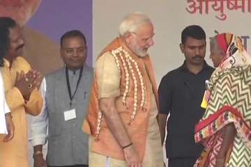 PM Modi gifted pair of slippers to a tribal woman in Chhattisgarh's Bijapur.