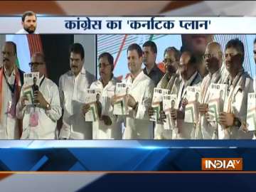 Rahul Gandhi. CM Siddaramaiah release Congress manifesto for Karnataka Assembly elections.