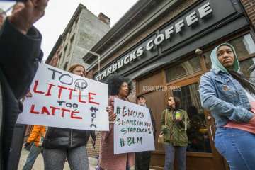 Starbucks to close 8,000 US stores for several hours for racal-bias training.