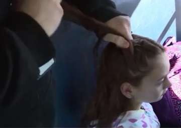 bus driver braids hair of motherless child