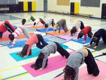 Yoga classes in school may help kids fight stress, anxiety