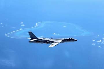 China's air force said that its fighter jets, including an H-6K bomber, had recently conducted take-off and landing training on an island reef in the resource-rich South China Sea.