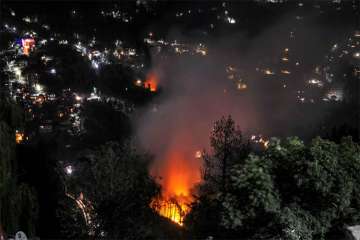 Shimla: A hillside glows with embers after a major fire broke out through a forest